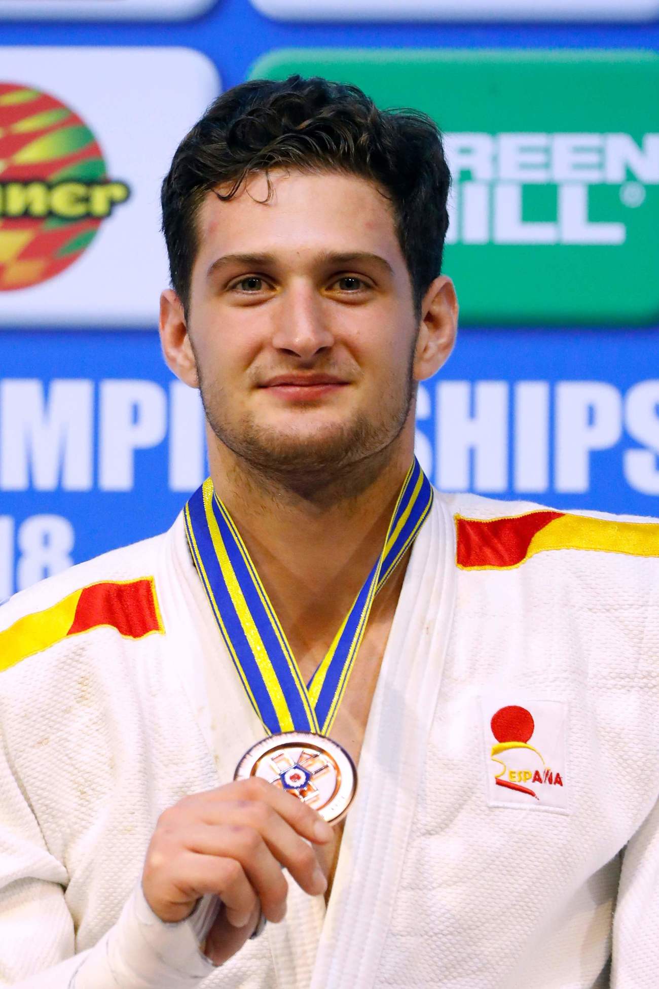 Nikoloz Sherazadishvili Con El Bronce En El MARCA