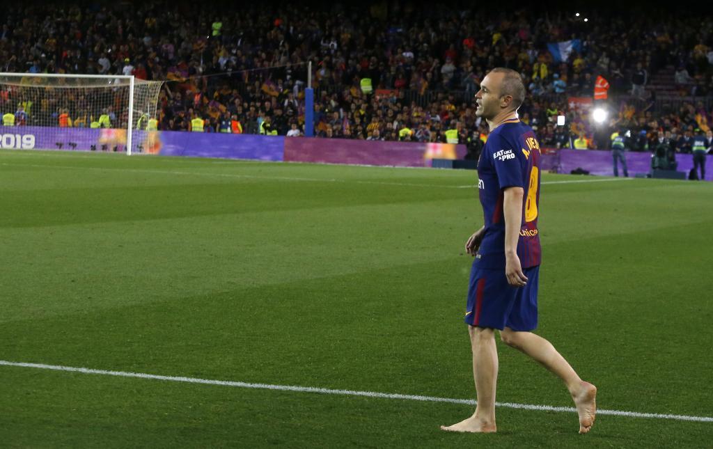 Iniesta without boots at Camp Nou