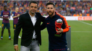 Xavi y Messi.