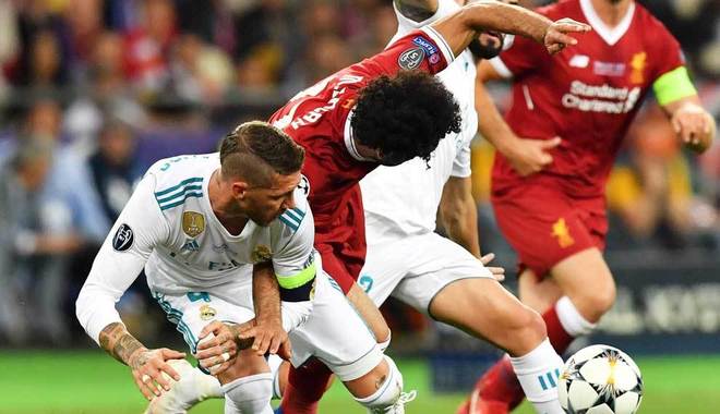 Sergio Ramos and Mohamed Salah in action during the Champions League...