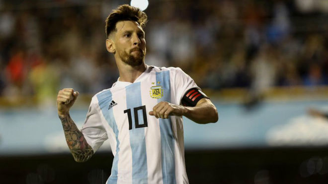 Lionel Messi celebrates after scoring a penalty against Haiti