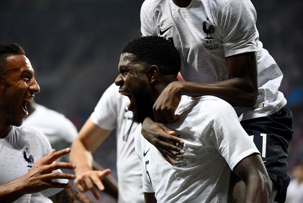 France&apos;s defender Samuel Umtiti celebrates after scoring a goal during...
