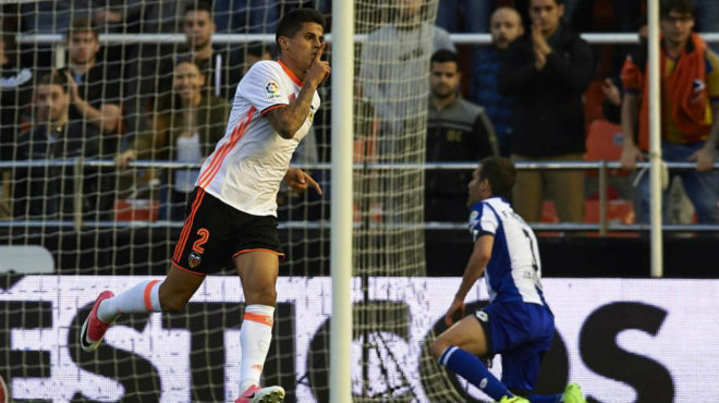 Joao Cancelo celebrates a goal with Valencia CF