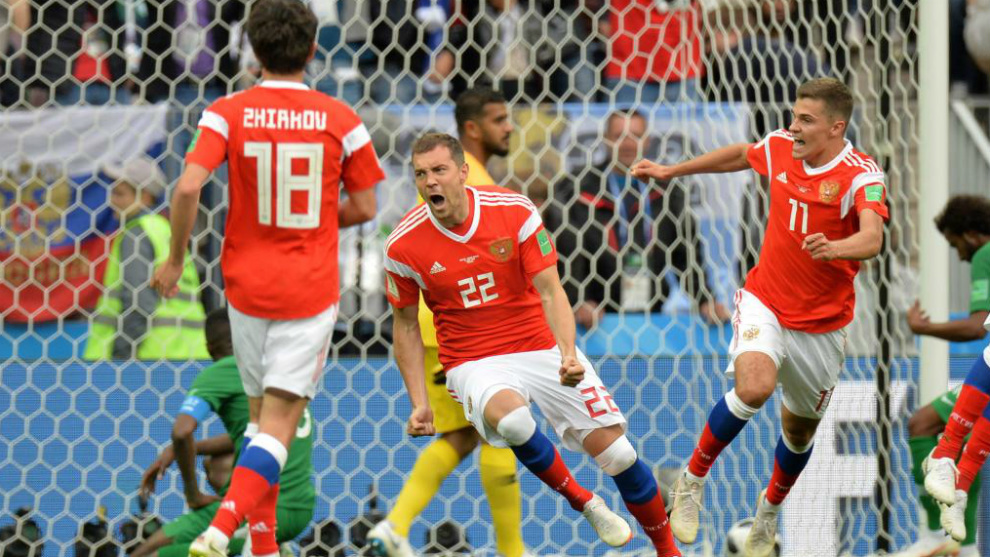 Artem Dzyuba (C) of Russia celebrates after scoring the 3-0 goal.
