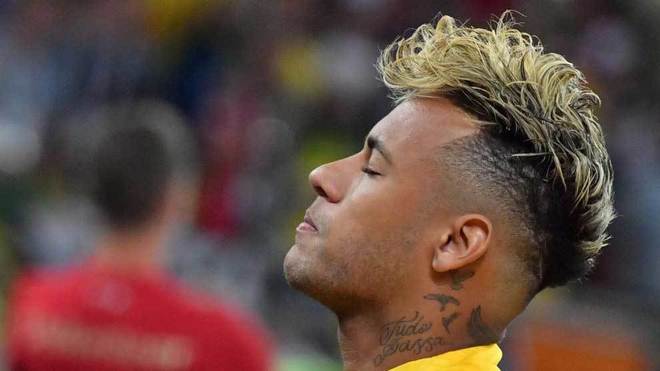 Neymar reacts before the match between Brazil and Switzerland.