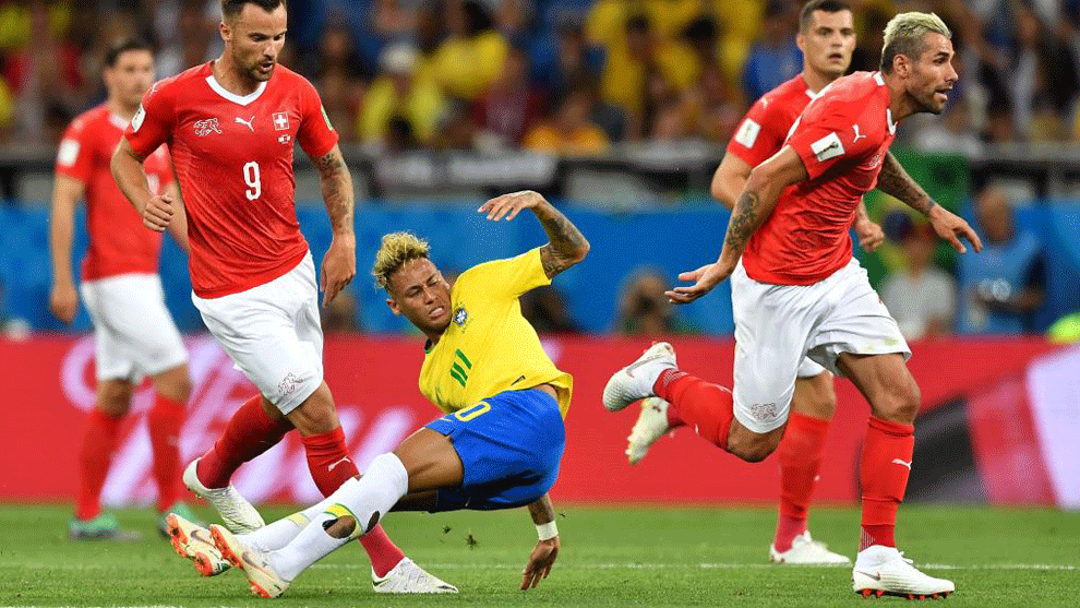 Neymar falls during the game between Brazil and Switzerland