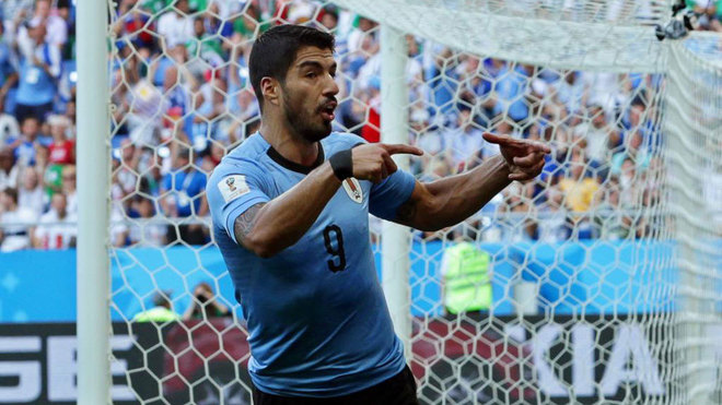 Luis Suarez celebrates after scoring the 1-0 lead during the match...