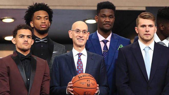 Commissioner Adam Silver poses with Trae Young, Marvin Bagley III,...