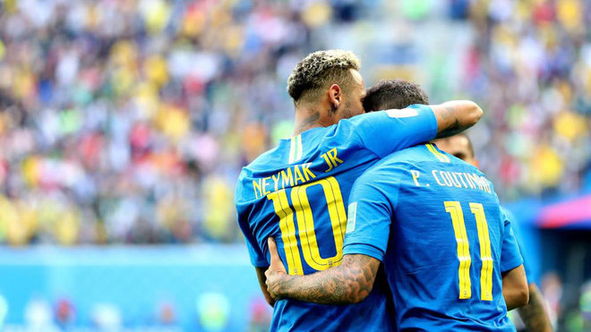 Philippe Coutinho celebrates scoring the 1-0 with Neymar during the...