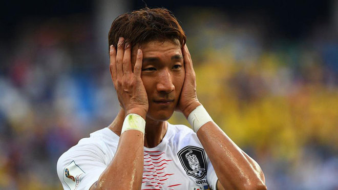 Ki Sung-yueng reacts to the defeat following the match between Sweden...