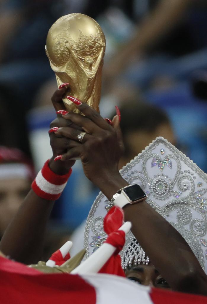 A danish fan lifts the (replica) world cup MARCA English
