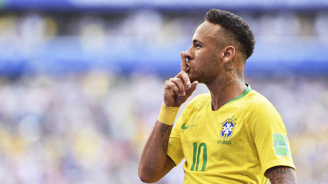Neymar celebrates scoring a goal during the match between Brazil and...