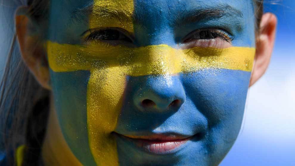 Colourful Sweden fans celebrate their teams progress in Russia