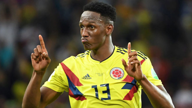 Yerry Mina celebrates a goal in the World Cup