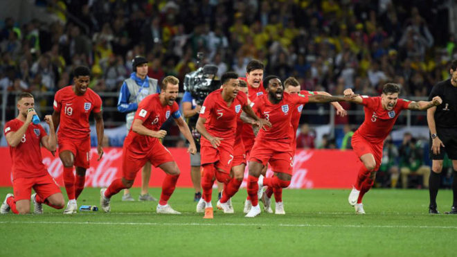 Players of England celebrate winning the match against Colombia.
