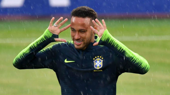 Brazil&apos;s forward Neymar attends a training session.