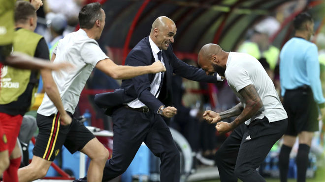 Roberto Martinez celebrates with Belgium assistant coach, Thierry...