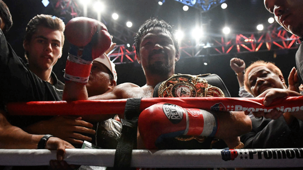 Manny Pacquiao  celebrates his victory against Lucas Matthysse after...