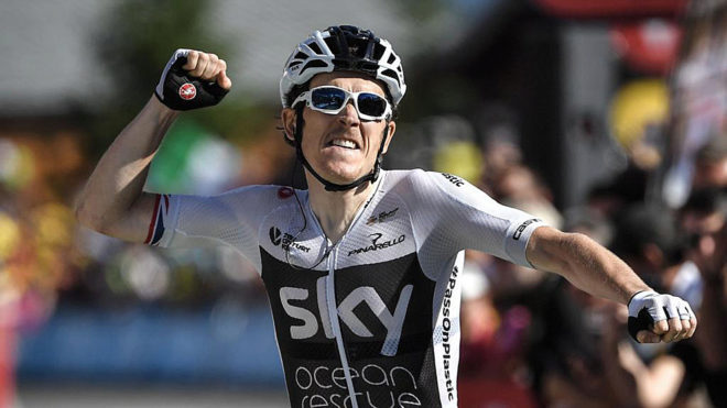 Geraint Thomas celebrates as he crosses the finish line to win the...