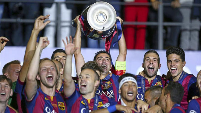Xavi Hernandez of Barcelona lifts the Champions League trophy