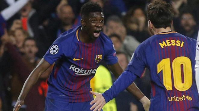 Dembele celebrates with Lionel Messi after scoring