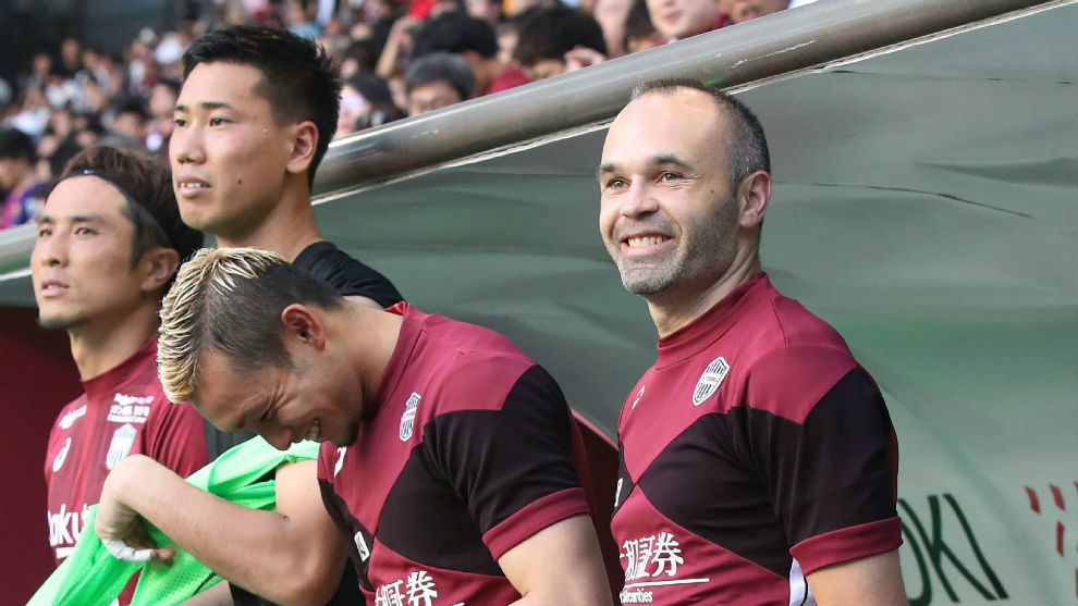 Vissel Kobe&apos;s new signing, Andres Iniesta, looks on from the bench...