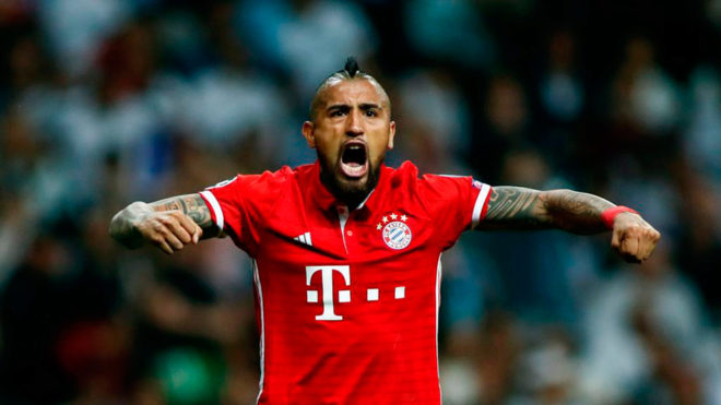 Vidal celebrates an own goal by Real Madrid during the Champions...
