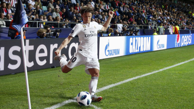 Modric takes a corner in the European Super Cup against Atletico...