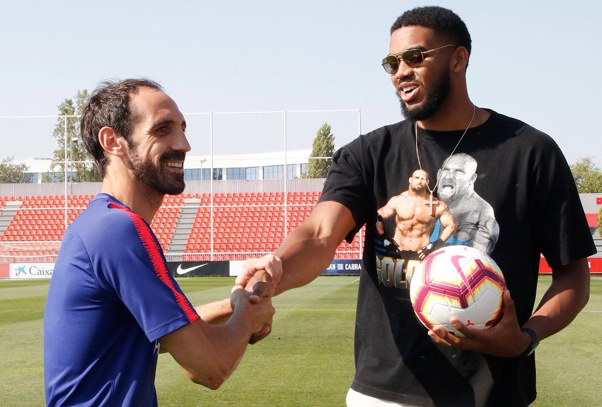 Juanfran and Karl Anthony Towns.