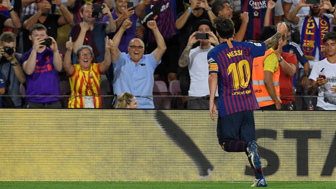 Barcelona&apos;s Argentinian forward Lionel Messi celebrates after scoring...
