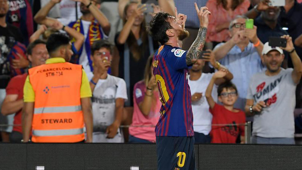 Messi celebrates after scoring a goal.