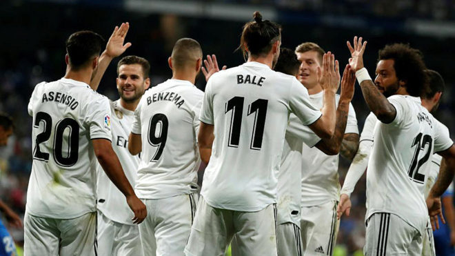 Real&apos;s Welsh forward Gareth Bale celebrates with teammates after...