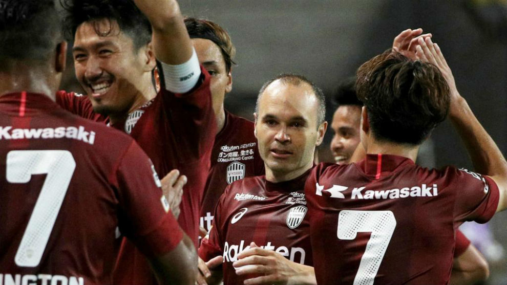 Iniesta of Vissel Kobe celebrates a goal with his teammates during a...