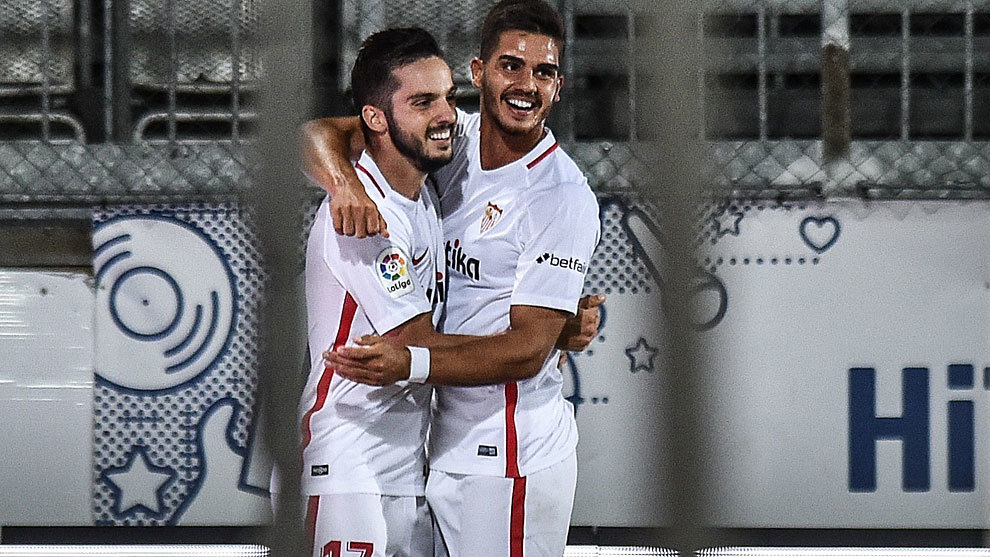 Sarabia and Andre Silva celebrate after scoring.