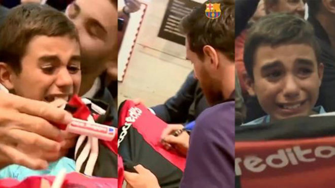 Young fan receives Lionel Messi&apos;s autograph