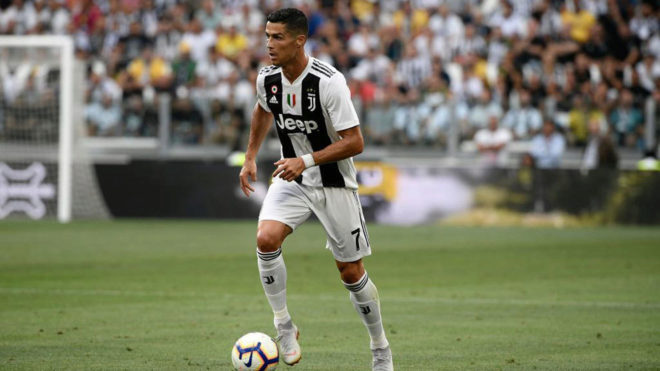 Cristiano Ronaldo controls the ball during the Italian Serie A...