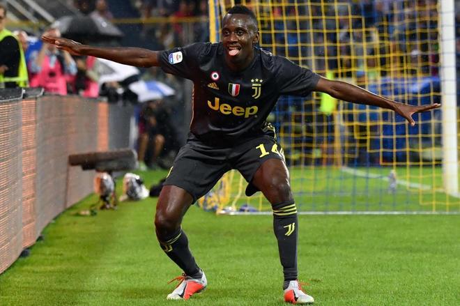 Juventus&apos; French midfielder Blaise Matuidi celebrates after scoring a...