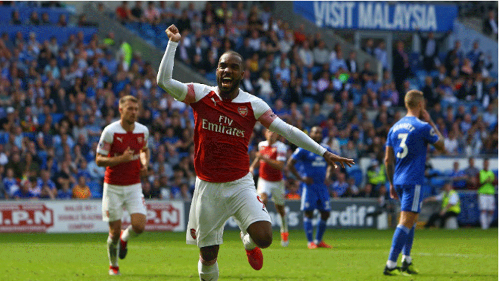 Lacazette celebrates after playing the assist for their second goal...