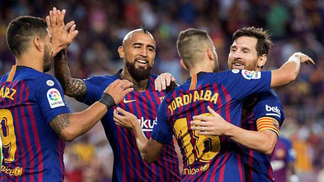 Barcelona players celebrate Alba&apos;s goal.