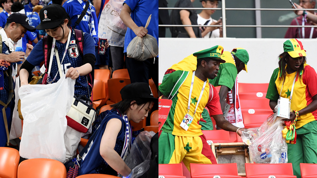 Aficionados de Japn y Senegal limpian las gradas tras el encuentro...