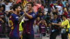 Messi celebra un tanto contra el PSV con Sergi Roberto.