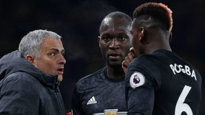 Mourinho reacts as he talks with Lukaku and  Pogba during the between...