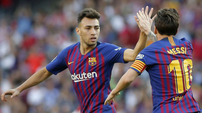 Munir El Haddadi and Lionel Messi