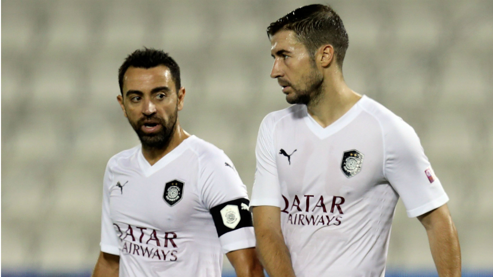Xavi y Gabi, durante un partido con Al Sadd