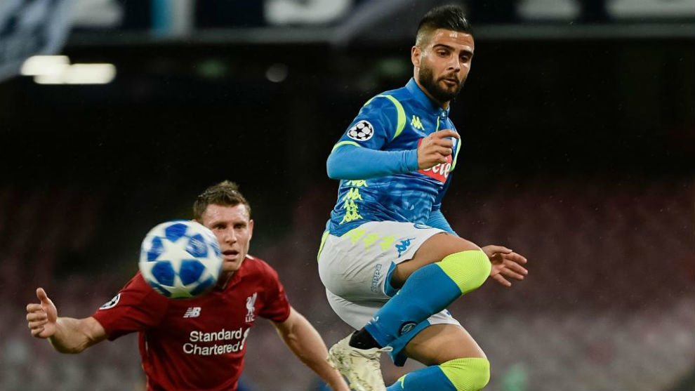 Lorenzo Insigne back heels the ball against Liverpool.