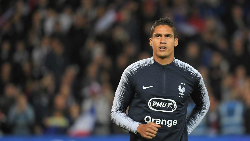 Varane warms up ahead of the friendly football match between France...