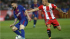 Maffeo agarra a Messi en el Girona-Barcelona del pasado ao.