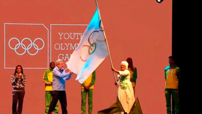 La entrega de la bandera olímpica al nuevo organizador.