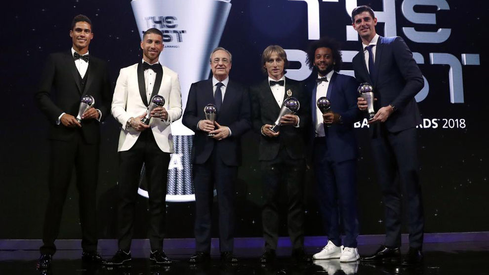 Florentino Perez and some of Real Madrid&apos;s players.