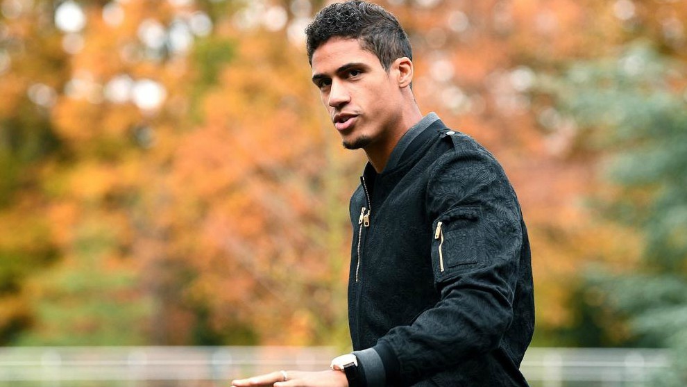 Varane gestures as he arrives in Clairefontaine on November 12, 2018,...